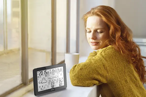 Weather forecast center on the windowsill.