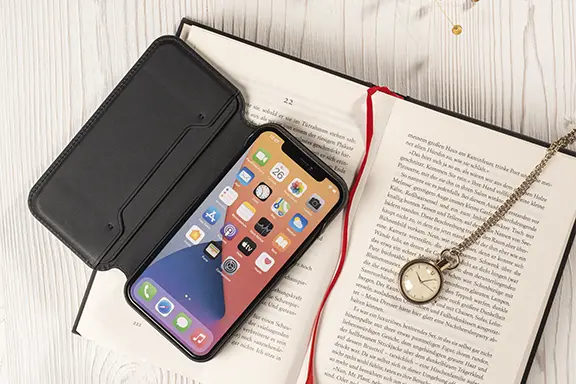 Phone in the mobile phone pocket.